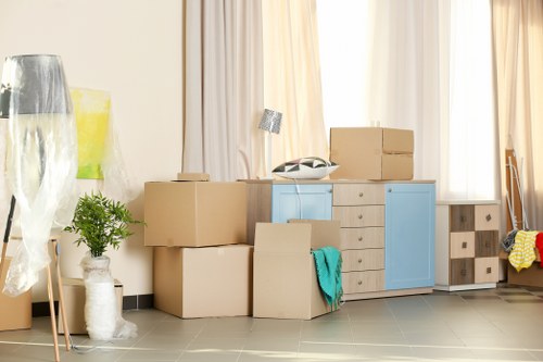 Removal van and packed boxes representing a Croydon house move