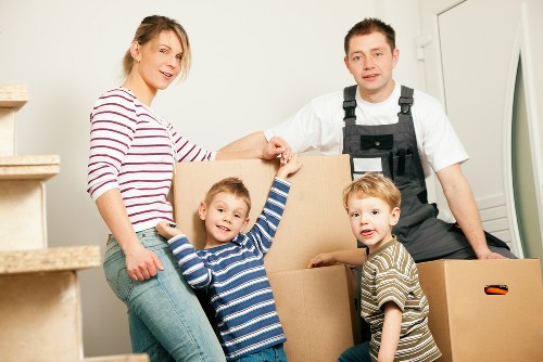 Loading furniture into a van for a Croydon house move