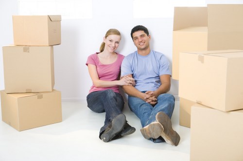 Professional movers handling furniture and boxes in Croydon