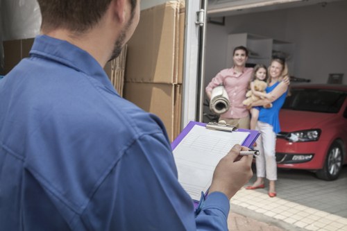 Professional Croydon movers handling packed boxes carefully