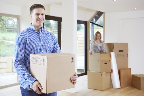 Professional moving team preparing items for transport in Croydon