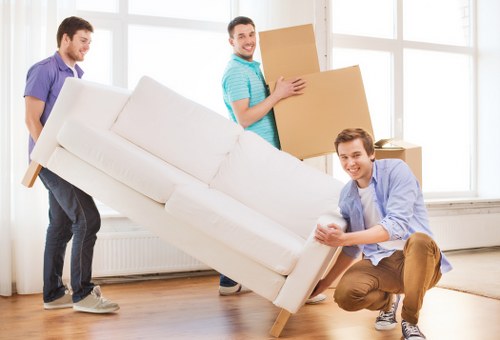 Moving team planning removals in Croydon outside a residential property