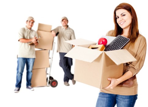 Moving team handling furniture in a Croydon apartment move