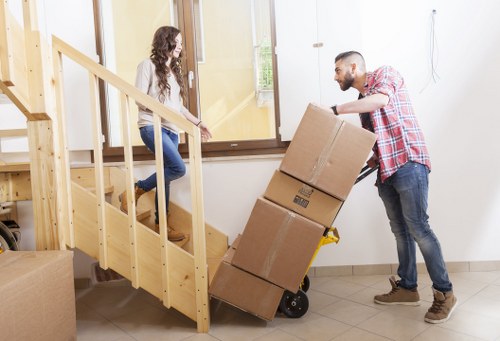 Local movers loading furniture and boxes for transport in Croydon