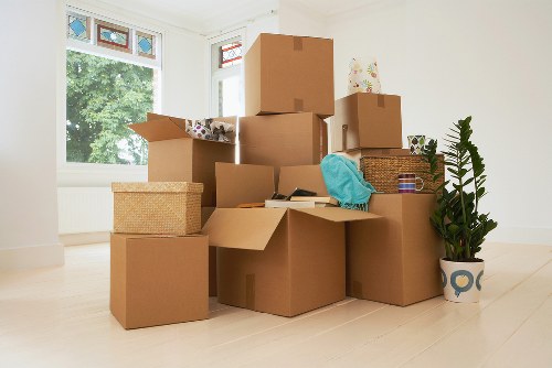 Sorted cardboard, metal, and wood prepared for recycling after a move